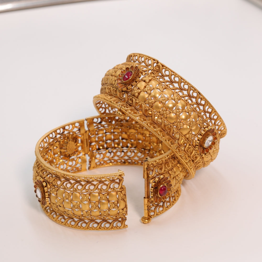 Gold Bangles with Ruby Accents
