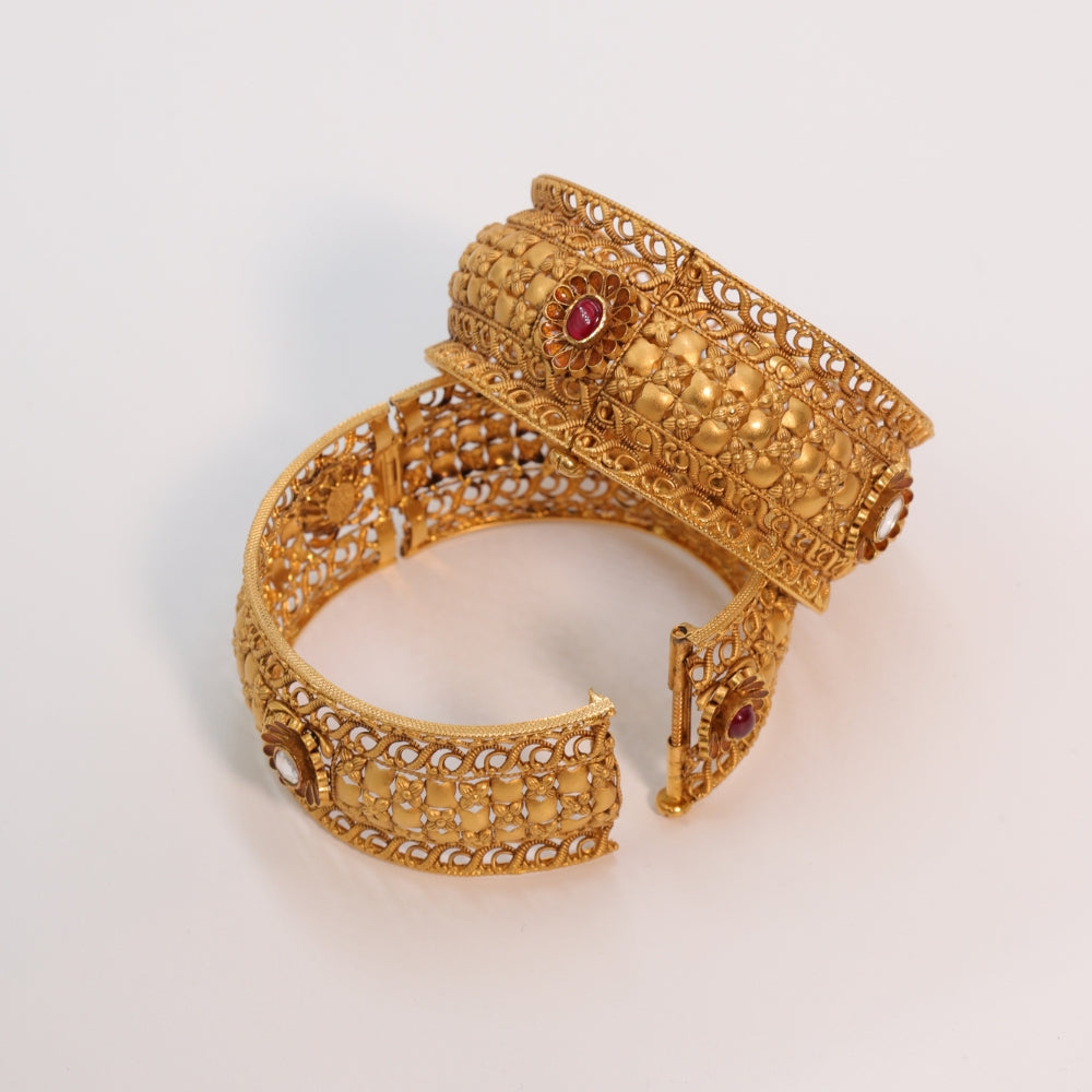 Gold Bangles with Ruby Accents
