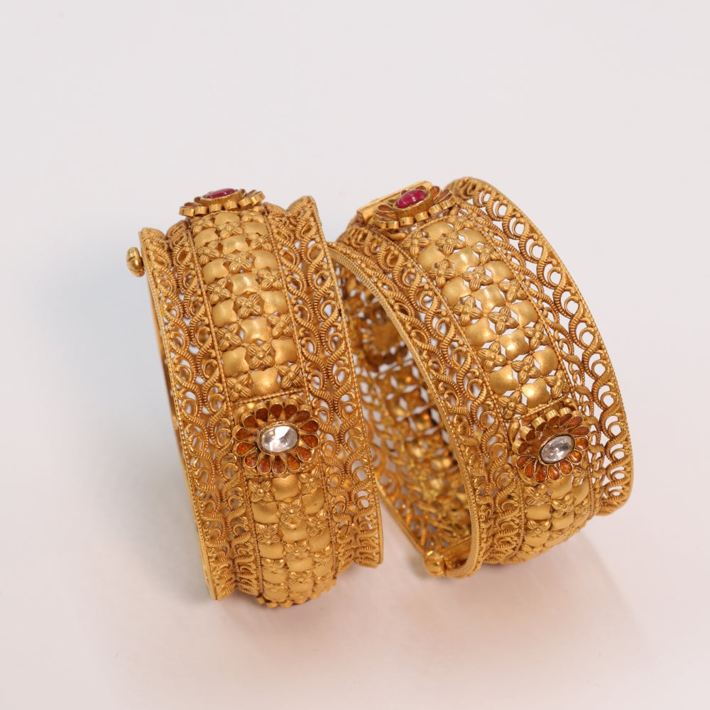 Gold Bangles with Ruby Accents