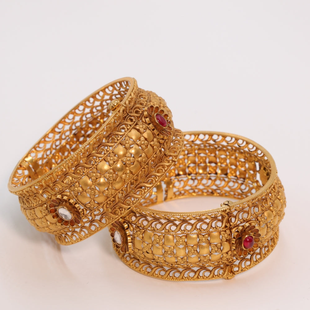 Gold Bangles with Ruby Accents