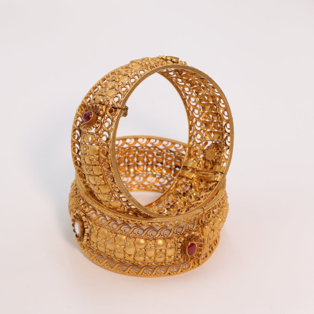 Gold Bangles with Ruby Accents